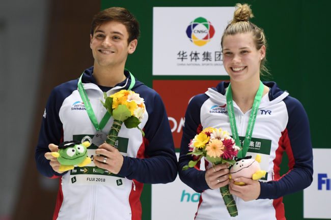 FUJI, JAPAN - MARCH 17: Grace Reid and Thomas Daley of Great Britain (silver) smile on the podium after the Mixed 3m Synchro Springboard final during day three of the FINA Diving World Series Fuji at Shizuoka Prefectural Fuji Swimming Pools on March 17, 2018 in Fuji, Shizuoka, Japan. (Photo by Atsushi Tomura/Getty Images)