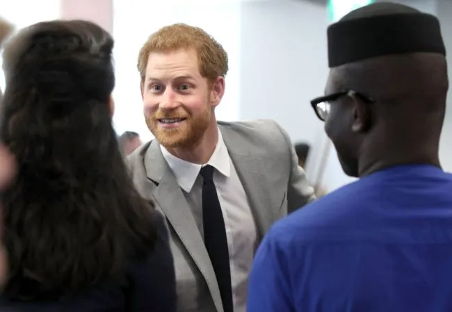 Britain's Prince Harry's attends a reception with delegates from the Commonwealth Youth Forum in central London on April 18, 2018, on the sidelines of the Commonwealth Heads of Government meeting (CHOGM). / AFP PHOTO / POOL / Yui Mok (Photo credit should read YUI MOK/AFP/Getty Images)