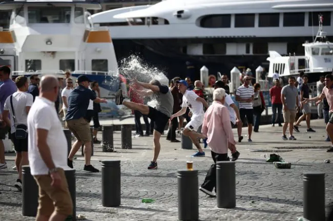 MARSEILLE, FRANCE - JUNE 11: England fans clash ahead of the game against Russia later today on June 11, 2016 in Marseille, France. Football fans from around Europe have descended on France for the UEFA Euro 2016 football tournament. (Photo by Carl Court/Getty Images)