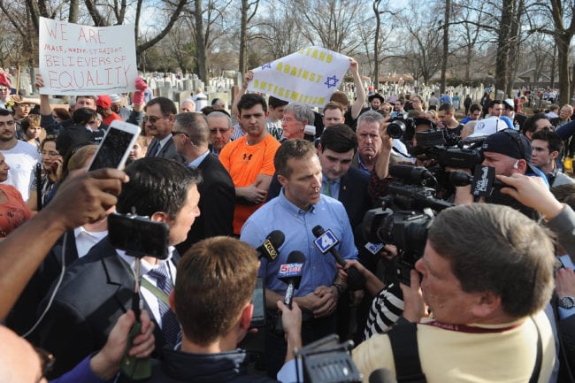 UNIVERSITY CITY, MO - FEBRUARY 22: Missouri Governor Eric Greitens speaks to the media at Chesed Shel Emeth Cemetery on February 22, 2017 in University City, Missouri. Governor Eric Greitens and U.S. Vice President Mike Pence were on hand to speak to over 300 volunteers who helped cleanup after the recent vandalism. Since the beginning of the year, there has been a nationwide spike in incidents including bomb threats at Jewish community centers and reports of anti-semitic graffiti. (Photo by Michael Thomas/Getty Images)