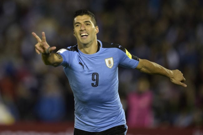 Uruguay's Luis Suarez celebrates after scoring his second goal against Bolivia during their 2018 World Cup football qualifier match in Montevideo, on October 10, 2017. / AFP PHOTO / Miguel Rojo        (Photo credit should read MIGUEL ROJO/AFP/Getty Images)