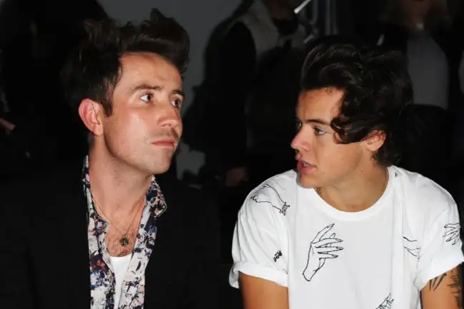 LONDON, ENGLAND - SEPTEMBER 17: Nick Grimshaw and Harry Styles attend the Fashion East show during London Fashion Week SS14 at TopShop Show Space on September 17, 2013 in London, England. (Photo by Stuart C. Wilson/Getty Images)