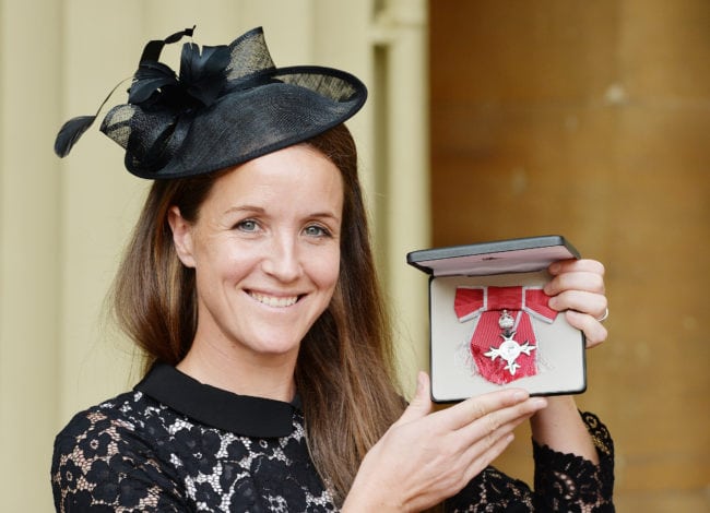LONDON, UNITED KINGDOM - OCTOBER 06: Casey Stoney holds her MBE (Member of the British Empire) award, after it was presented to her by the Princess Royal, at the Investiture ceremony at Buckingham Palace on October 6, 2015 in London. (Photo by John Stillwell - WPA Pool/Getty Images)