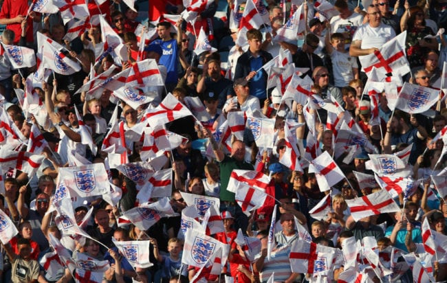 LEEDS, ENGLAND - JUNE 07:  England fans wave with flags during the International Friendly match between England and Costa Rica at Elland Road on June 7, 2018 in Leeds, England.  (Photo by Alex Livesey/Getty Images)