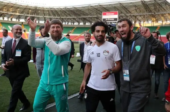 Egyptian national team football player and Liverpool's star striker Mohamed Salah (2ndR) and head of the Chechen Republic Ramzan Kadyrov (2ndL) pose during a training of Egyptian team at the Akhmat Arena stadium in Grozny on June 10, 2018, ahead of the Russia 2018 World Cup. - Egypt's national football team will use the venue as their base camp training site. (Photo by KARIM JAAFAR / AFP) (Photo credit should read KARIM JAAFAR/AFP/Getty Images)