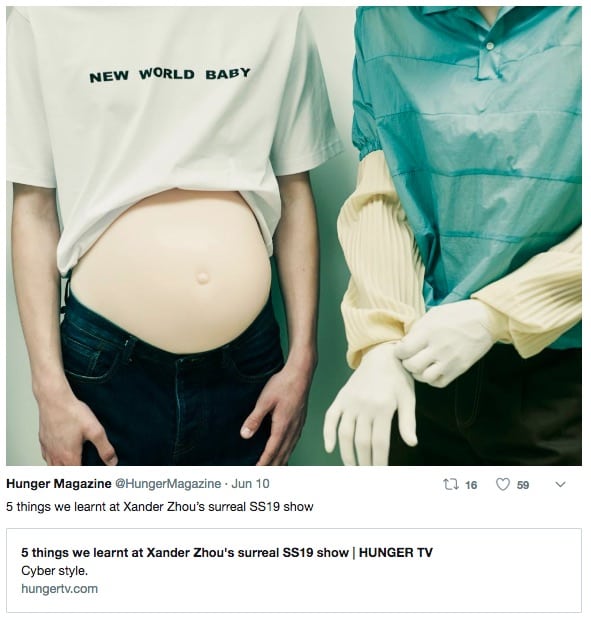 One model is seen wearing a top saying New World Baby (Twitter/@HungerMagazine)