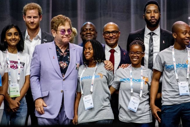 British Prince Harry (2ndL) and sir Elton John (3rdL) pose for a picture during a session about the Elton John Aids Fund on the second day of the Aids2018 conference, in Amsterdam on July 24, 2018. - From 23 to July 27, thousands of delegates -- researchers, campaigners, activists and people living with the killer virus -- attend the 22nd International AIDS Conference amid warnings that "dangerous complacency" may cause an unstoppable resurgence. (Photo by Robin Utrecht / ANP / AFP) / Netherlands OUT        (Photo credit should read ROBIN UTRECHT/AFP/Getty Images)