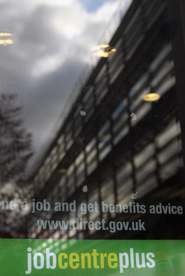 LONDON - OCTOBER 21: A sign is displayed in the window of a Job Centre in Westminster on October 21, 2010 in London, United Kingdom. The Office for Budget Responsibility has forecasted that up to 490,000 jobs in the public sector could be lost in the next four years, after yesterdays spending review announcement by Chancellor of the Exchequer George Osborne. Mr Osborne has defended the UK spending cuts he announced yesterday after Labour and other critics claimed that slashing welfare and housing benefits would hit the poorest in society hardest. 