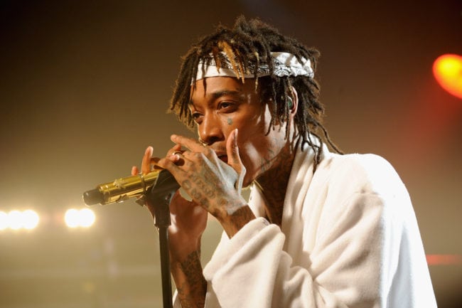 NEW YORK, NY - AUGUST 13:  Wiz Khalifa performs onstage at the iHeartRadio Live P.C. Richard & Son Theater on August 13, 2014 in New York City.  (Photo by Bryan Bedder/Getty Images for Clear Channel)