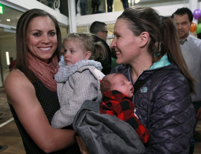 SALT LAKE CITY, UT - NOVEMBER 9: Candice Green Barret (R) and her wife Megan Barrett (L) with their children Quinn and Tucker Pose for a picture at a rally and party in support of gay and lesbian families sponsored by the Utah Pride Center on November 9, 2015 in Salt Lake City, Utah. Last week the Mormon Church announced changes to their policies to  classify people who enter into gay and lesbian marriages as apostates and ban their children from being blessed and baptized into the Mormon Church. Neither on of the Barret's children will be able to be baptized into the Mormon Church because their lesbian parents were married. (Photo by George Frey/Getty Images