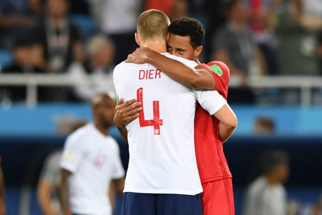 TOPSHOT - England's midfielder Eric Dier (L) hugs Belgium's midfielder Moussa Dembele at the end of the Russia 2018 World Cup Group G football match between England and Belgium at the Kaliningrad Stadium in Kaliningrad on June 28, 2018. (Photo by OZAN KOSE / AFP) / RESTRICTED TO EDITORIAL USE - NO MOBILE PUSH ALERTS/DOWNLOADS        (Photo credit should read OZAN KOSE/AFP/Getty Images)