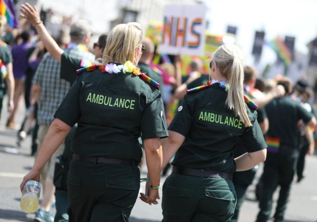 LONDON, ENGLAND - JULY 07: Ambulance Services march along Piccadilly Circus during Pride In London on July 7, 2018 in London, England. It is estimated over 1 million people will take to the streets and approximately 30,000 people and 472 organisations will join the annual parade, which is one of the world's biggest LGBT+ celebrations. 