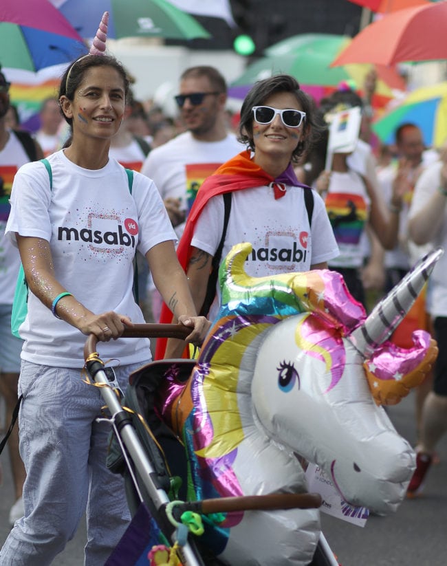 LONDON, ENGLAND - JULY 07:  Parade goers in Trafalgar Square during Pride In London on July 7, 2018 in London, England. It is estimated over 1 million people will take to the streets and approximately 30,000 people and 472 organisations will join the annual parade, which is one of the world's biggest LGBT+ celebrations. 