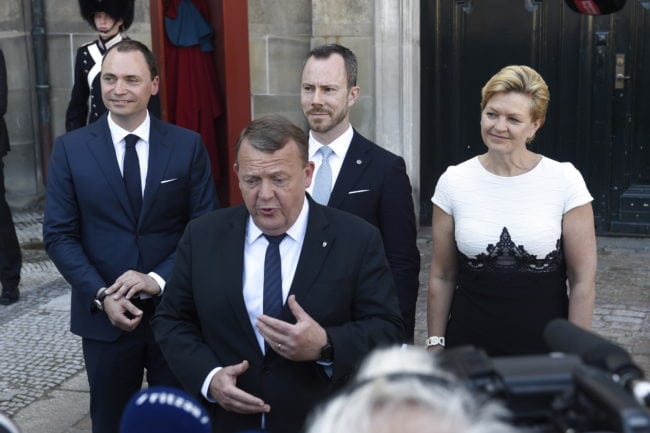 Newly appointed Minister of Education and Research Tommy Ahlers (L), Prime Minister Lars Loekke Rasmussen (Front), newly appointed Minister for Environment Jakob Ellemann-Jensen (Center Back) and newly appointed Minister for Fisheries, Equal Rights and Nordic Cooperation Eva Kjer Hansen (R) give a press statement in front of the Amalienborg Castle in Copenhagen, Denmark, on 2 May 2018 after the constitutional visit of the Danish Queen. (Photo by Liselotte Sabroe / Ritzau Scanpix / AFP) / Denmark OUT        (Photo credit should read LISELOTTE SABROE/AFP/Getty Images)
