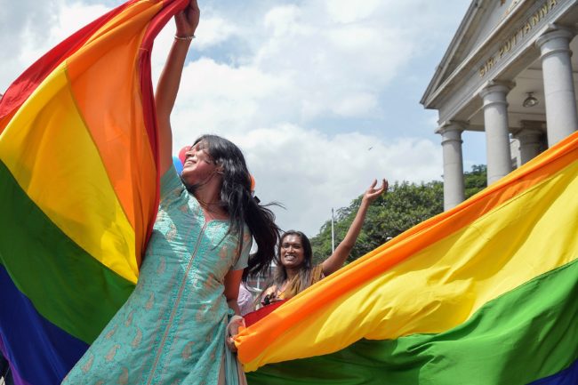 Indian members and supporters of the lesbian, gay, bisexual, transgender (LGBT) community celebrate the Supreme Court decision to strike down a colonial-era ban on gay sex, in Bangalore on September 6, 2018. - India's Supreme Court on September 6 struck down the ban that has been at the centre of years of legal battles. "The law had become a weapon for harassment for the LGBT community," Chief Justice Dipak Misra said as he announced the landmark verdict. (Photo by MANJUNATH KIRAN / AFP)        (Photo credit should read MANJUNATH KIRAN/AFP/Getty Images)
