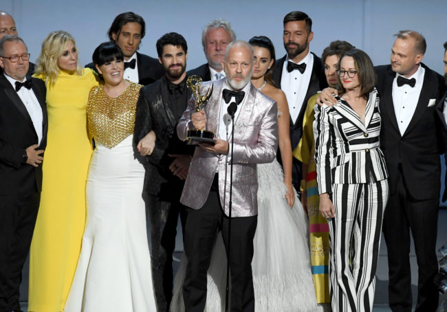 LOS ANGELES, CA - SEPTEMBER 17: Ryan Murphy (C) and cast and crew accepts the Outstanding Limited Series award for 'The Assassination of Gianni Versace: American Crime Story' onstage during the 70th Emmy Awards at Microsoft Theater on September 17, 2018 in Los Angeles, California. (Photo by Kevin Winter/Getty Images)