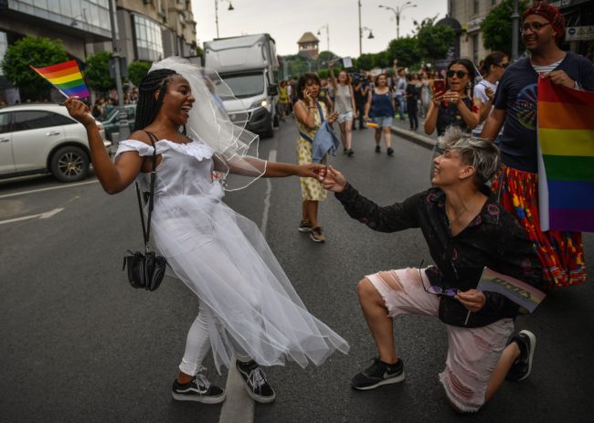 People take part in the Bucharest Pride 2018 March gay pride parade on June 9, 2018. (Photo by Daniel MIHAILESCU / AFP)        (Photo credit should read DANIEL MIHAILESCU/AFP/Getty Images)