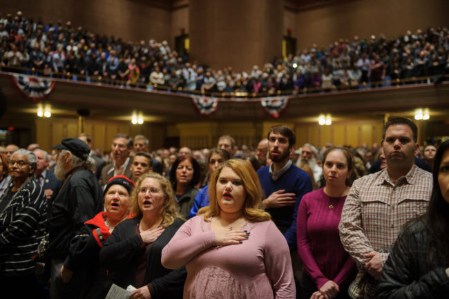 PITTSBURGH, PA - OCTOBER 28: People listen to interfaith speakers at the Soldiers and Sailors Memorial Hall during a service to honor and mourn the victims of Saturday's mass shooting at the Tree Of Life Synagogue on October 28, 2018 in Pittsburgh, Pennsylvania. Eleven people were killed and six more were wounded in the mass shooting that police say was fueled by antisemitism. (Photo by Jeff Swensen/Getty Images)
