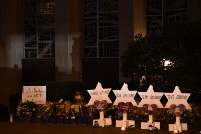 The names of the victims are displayed at a memorial on October 28, 2018 outside the Tree of Life synagogue after a shooting there left 11 people dead in the Squirrel Hill neighborhood of Pittsburgh on October 27. - A man suspected of bursting into a Pittsburgh synagogue during a baby-naming ceremony and gunning down 11 people has been charged with murder, in the deadliest anti-Semitic attack in recent US history. The suspect -- identified as a 46-year-old Robert Bowers -- reportedly yelled "All Jews must die" as he sprayed bullets into the Tree of Life synagogue during Sabbath services on Saturday before exchanging fire with police, in an attack that also wounded six people. (Photo by Brendan SMIALOWSKI / AFP) (Photo credit should read BRENDAN SMIALOWSKI/AFP/Getty Images)