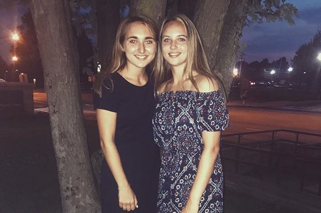 Disowned college student Emily Scheck poses with her girlfriend Justyna.