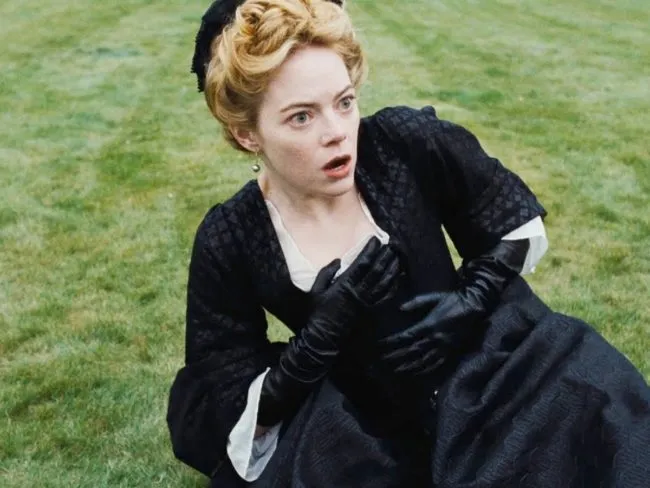 Emma Stone lies, shocked, on the ground in new lesbian film The Favourite