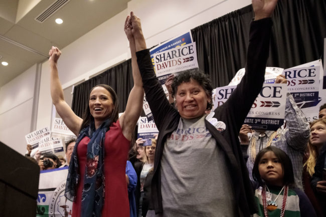 Sharice Davids celebrates with her mother Crystal Herriage her victory over incumbent Republican Kevin Yoder. (Whitney Curtis/Getty Images)