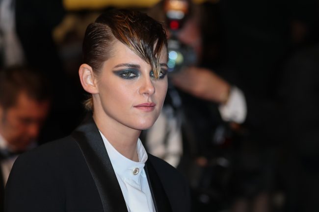 Kristen Stewart poses as she arrives at the Cannes Film Festival