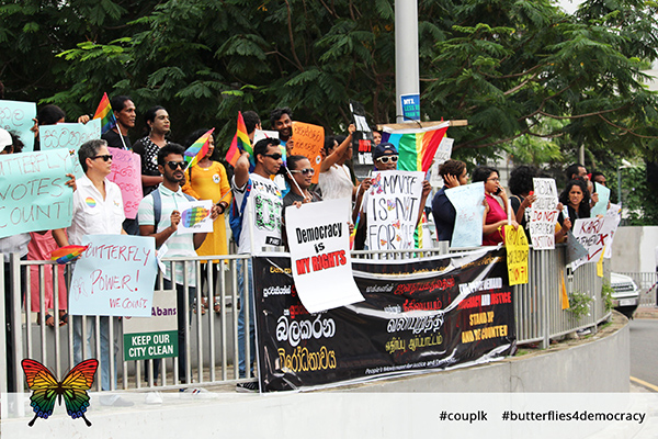 Sri Lanka LGBT rights activists carried signs saying 'Butterfly Power'