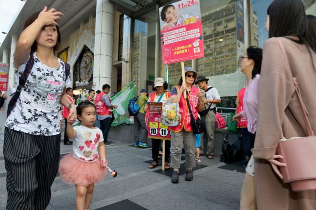 Anti-gay marriage activists hand out leaflets in Taiwan