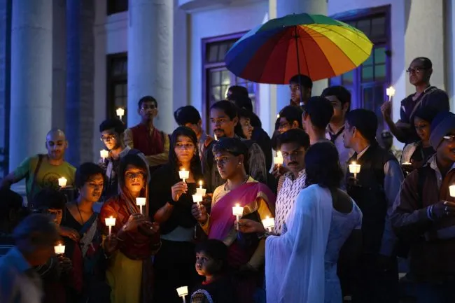 Transgender people take part in a candle light vigil for the Transgender Day of Remembrance in Bangalore on November 20, 2015.