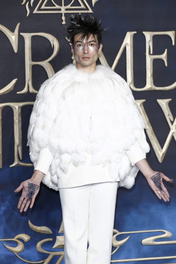 Ezra Miller attends the UK Premiere of Fantastic Beasts: The Crimes Of Grindelwald. He said he was "shocked" by a revelation in the film 
