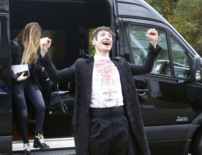 Ezra Miller and other cast members from Fantastic Beasts: The Crimes Of Grindelwald arrive to help celebrate Wizarding World Day at Parkside Middle School