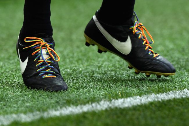 Match official wears rainbow laces to combat homophobic abuse during a Premier League match.