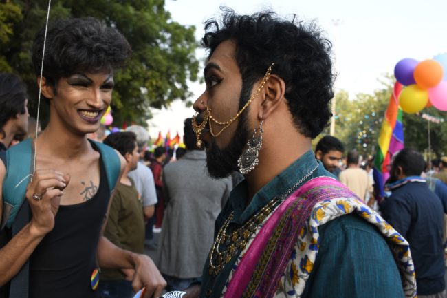 Attendees celebrate the first Pride parade after the landmark ruling by country's top court legalising gay sex
