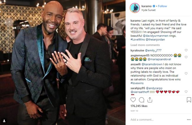 Karamo Brown and Ian Jordan pose with their engagement rings on Instagram