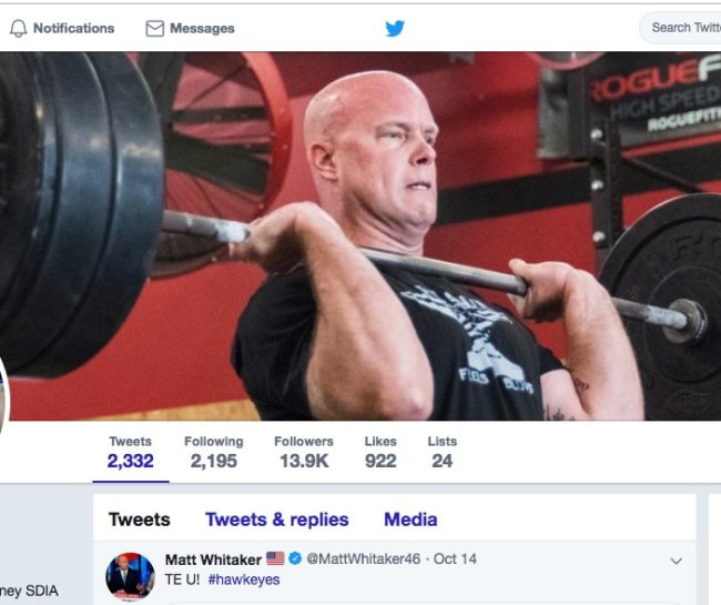 Matt Whitaker's Twitter cover shows him flexing his muscles. 