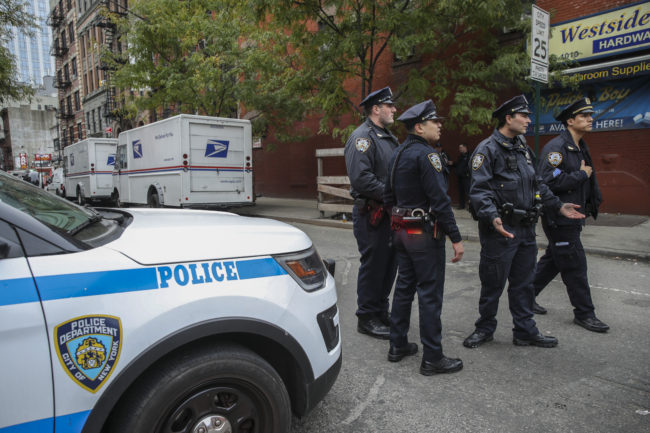 New York Police respond to a suspicious package at a U.S. Post Office facility at 52nd Street and 8th Avenue in Manhattan, October 26, 2018 in New York City. 
