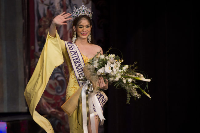 Kevin Balot, who features in the Pantene Philippines ad, waves the crowd as she wins Miss International Queen 2012 beauty contest in Pattaya on November 2, 2012. 