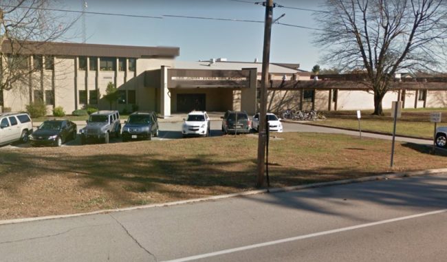 Photo of Leo Junior/Senior High School outside cars. The school is facing a lawsuit from the Gay-Straight Alliance 