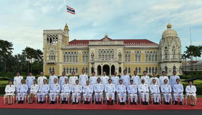 Thailand's junta chief and prime minister Prayut Chan-O-Cha sits with members of his cabinet at Government House in Bangkok on August 25, 2015.