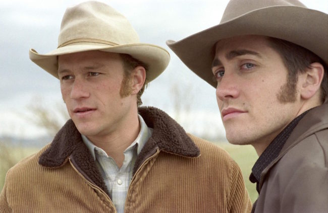 The stars of 2005 film Brokeback Mountain look into the distance