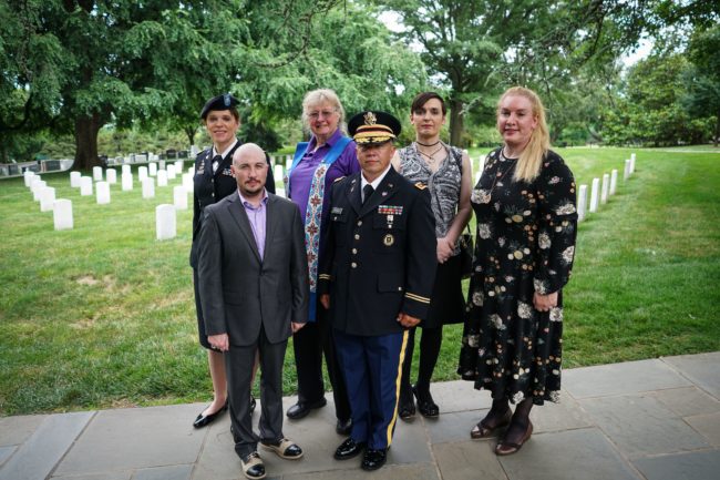 Trans troops pose for a photo in Arlington National Cemetery, from left: retired Army lieutenant colonel Ann Murdoch, Transgender American Veterans Association Vice President Gene Silvestri, Yvonne Cook-Riley, retired Army major and Transgender American Veterans Association President Evan Young, petty officer first class Alice Ashton and retired Air Force major Nella Ludlow