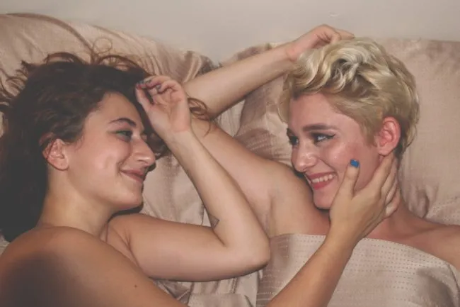 Stock photo showing lesbian porn or just two women in bed