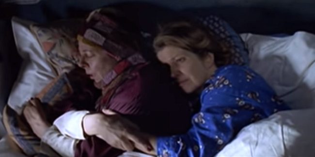 Frances de la Tour and Anne Reid embrace in a Love Actually scene