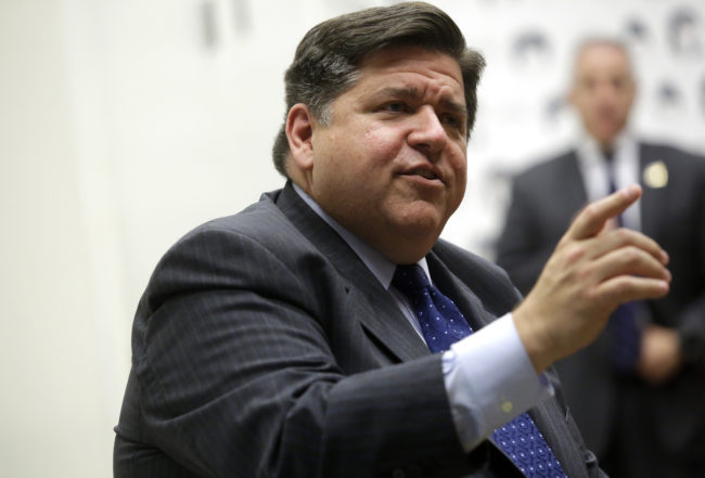 Illinois gubernatorial candidate J.B. Pritzker speaks during a round table discussion with high school students at a creative workspace for women
