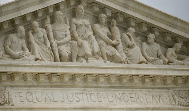 American Bar Association: A carving's on the front of the U.S. Supreme Court building reads 'Equal Justice Under Law' 