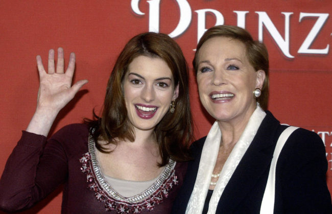Julie Andrews and Anne Hathaway pose during a photocall in Munich, on 22 September 2004, for Princess Diaries 2: The Royal Engagement