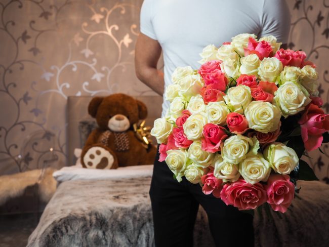 Valentine's Day gifts: Teddy bear and flowers
