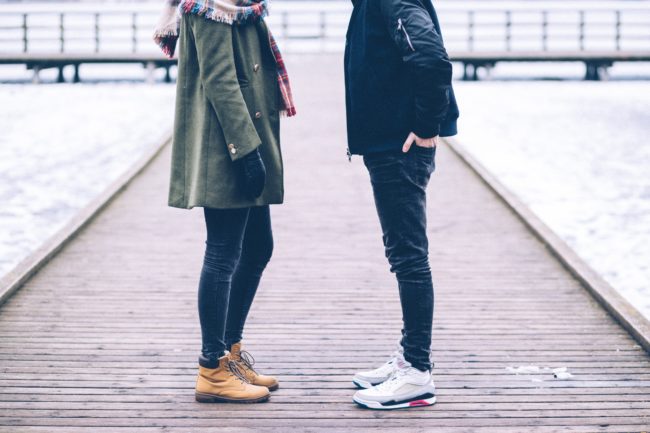 A couple wearing warm clothes and jackets