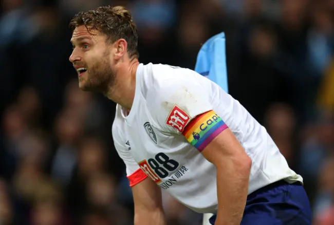 Simon Francis of AFC Bournemouth wearing a Stonewall rainbow captains armband during the Premier League match between Manchester City and AFC Bournemouth at Etihad Stadium on December 1, 2018 in Manchester, United Kingdom